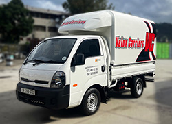 A Velox Carriers mini transport van